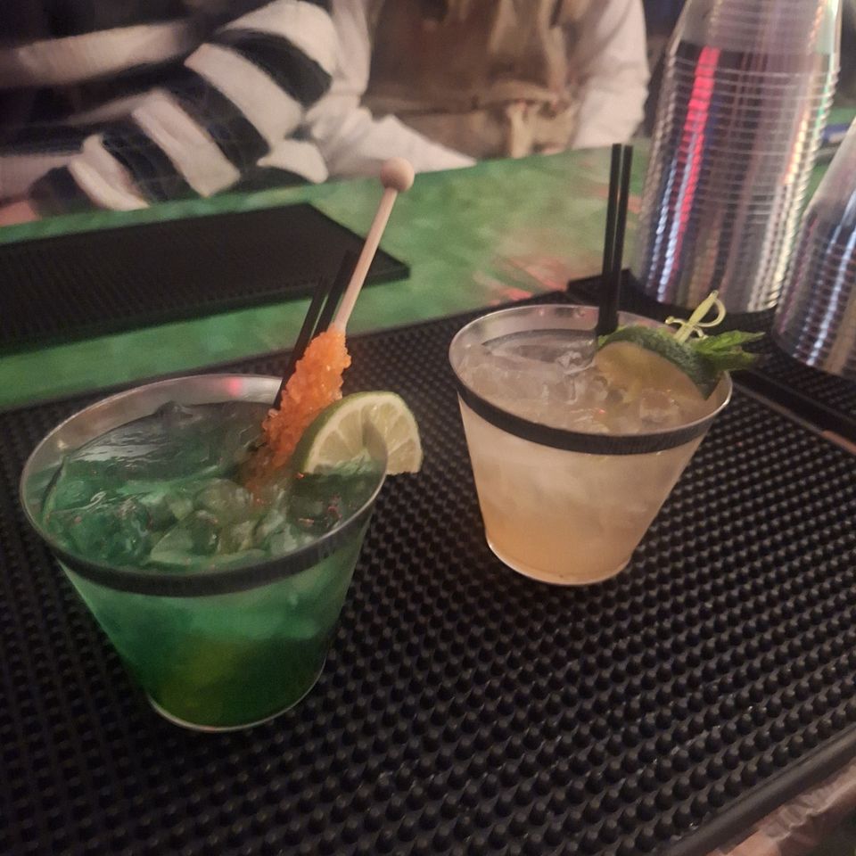 Poison Apple Mule and Creeper’s Curse cocktail served at a Halloween party