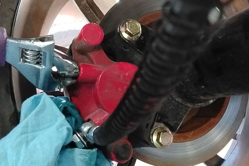 Close-up of brake repair on a golf cart by Neighborhood Golf Carts in Mandeville, LA