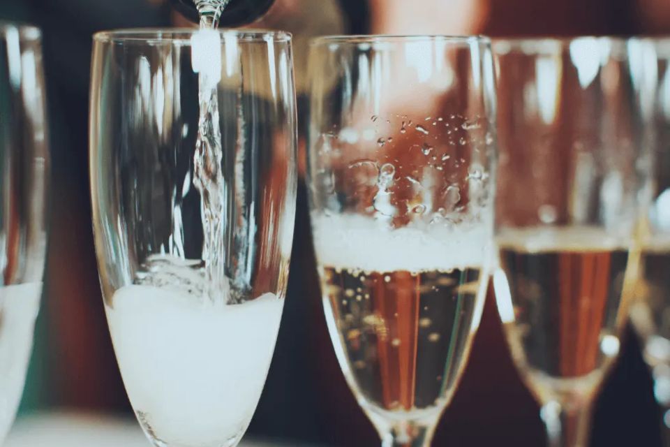 Pouring champgne into glasses