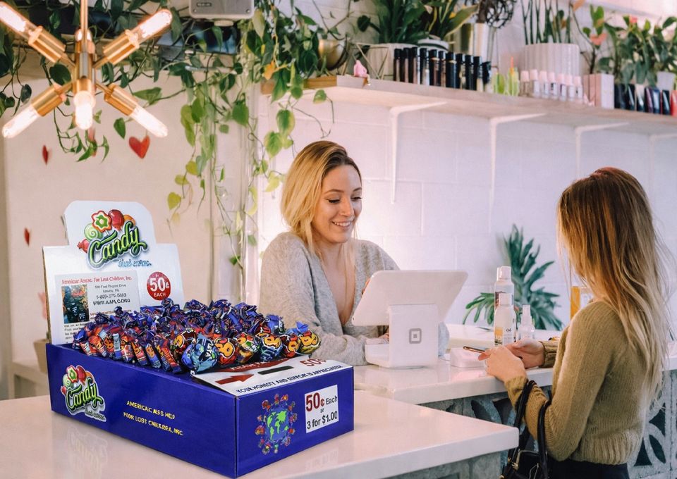 On location at a beauty salon. Honor box vending, widely accepted.