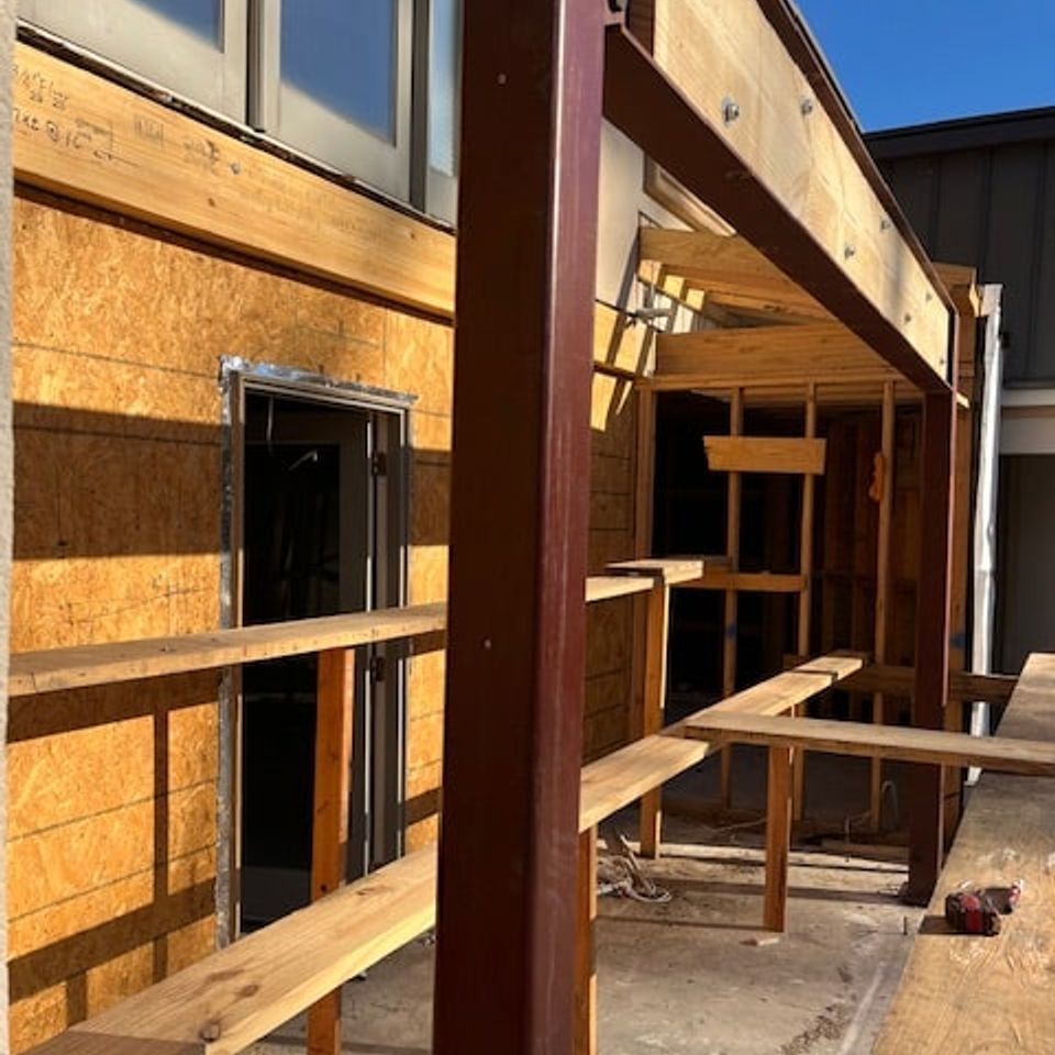 Steel structural framing installed for a home addition or patio extension by Marquez Welding in Houston