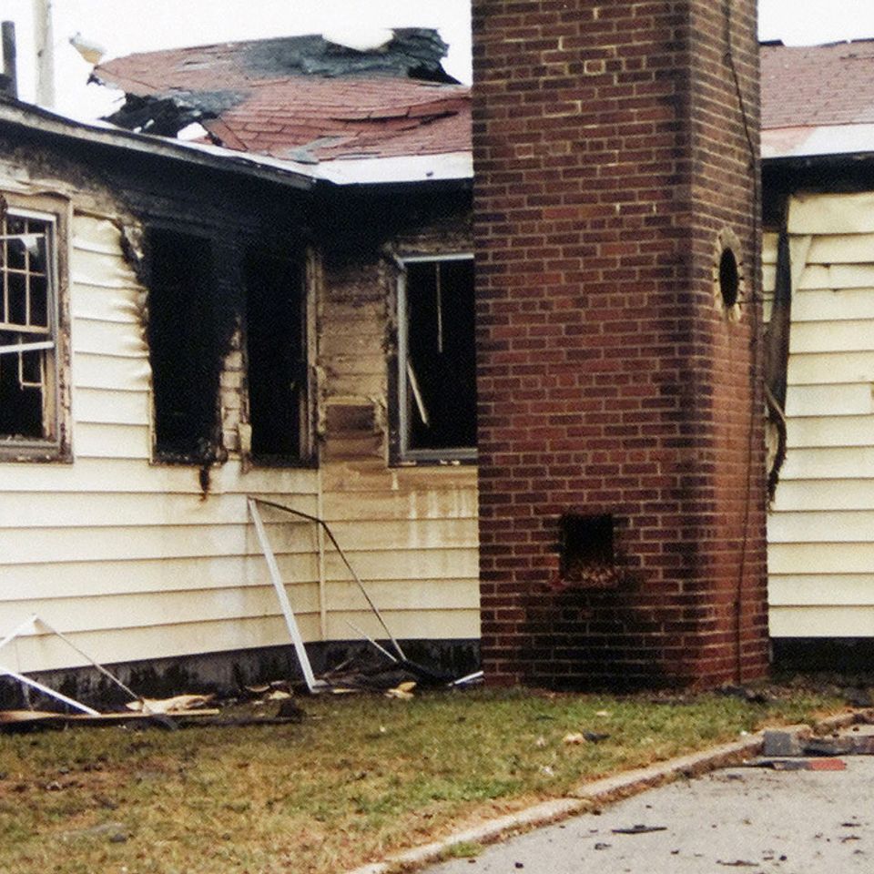 Exterior side view showing fire damage to building 2160 located at fort mccoy 06a355 1024