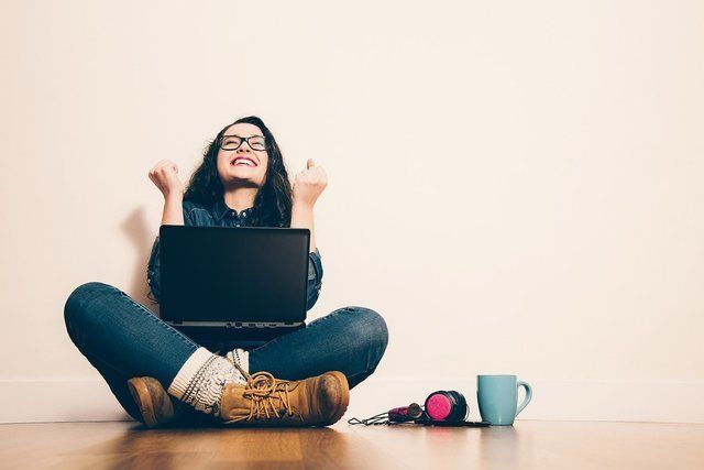 Happy laptop woman success