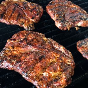 Pork steak on grill