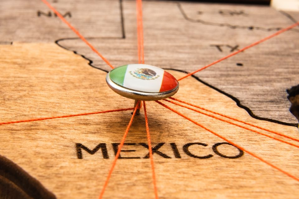 Mexico flag on the pushpin and red threads on the 2023 11 27 05 20 14 utc