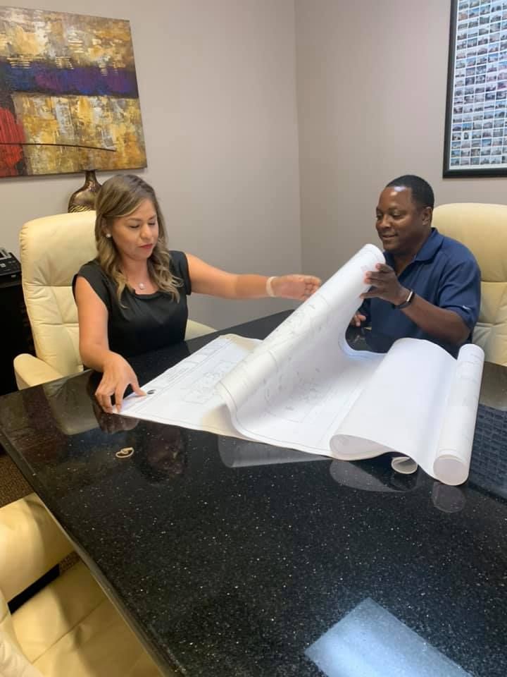 Nadel design   nancy delgado showing final blueprint to contractor  2