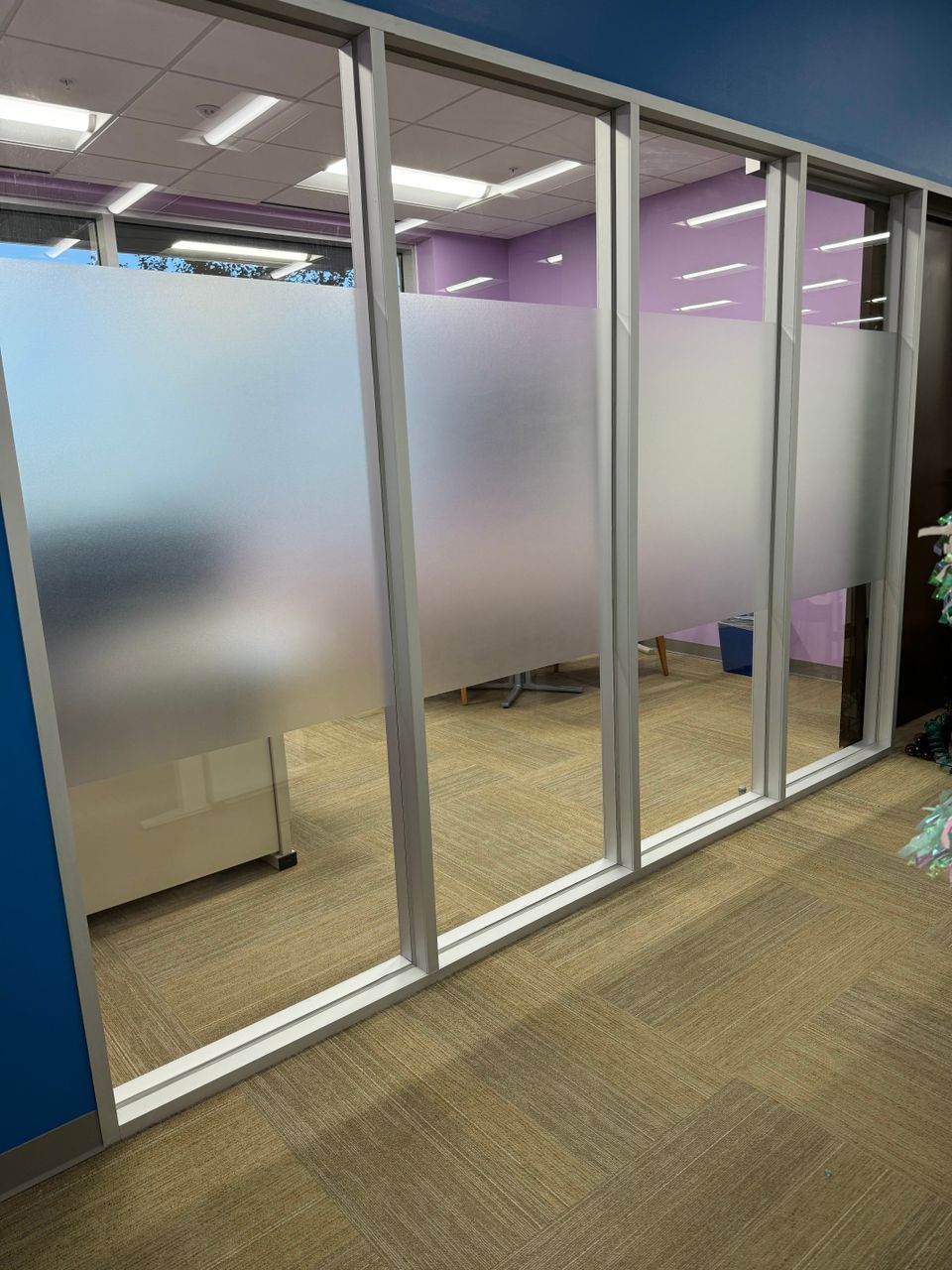 Decorative frosted window film applied to interior office glass in Sugar Land TX