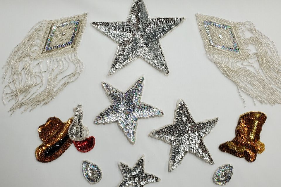 Assorted appliqués including silver stars
