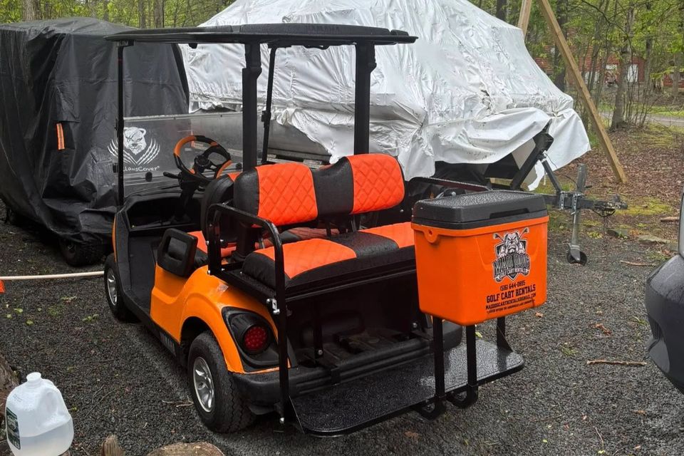 Branded orange golf cart rental from Mad Dog Golf Cart Rentals in Arrowhead Lake PA