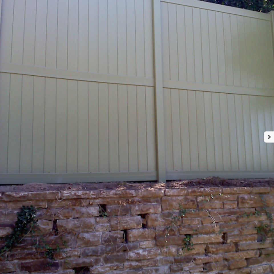 Midland vinyl fence   deck company   tulsa and coweta  oklahoma   vinyl metal wood fence sales and installation   privacy   vinyl stone color privacy fence on retaining wall  tall20170609 25591 j7bstg