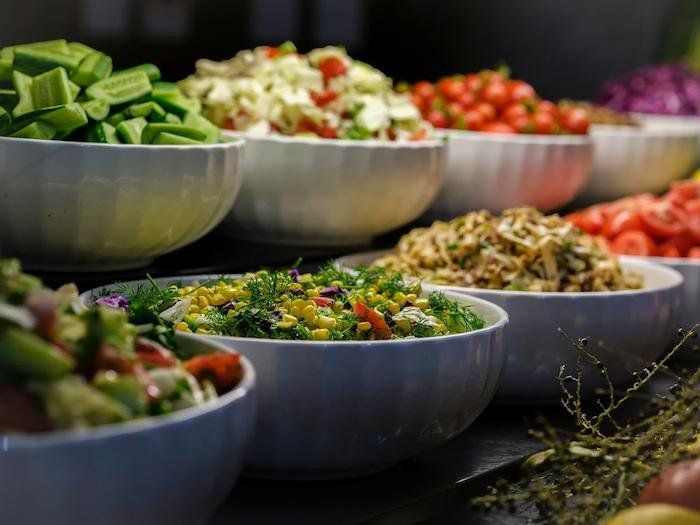 A display of beautiful foods in a buffet 
