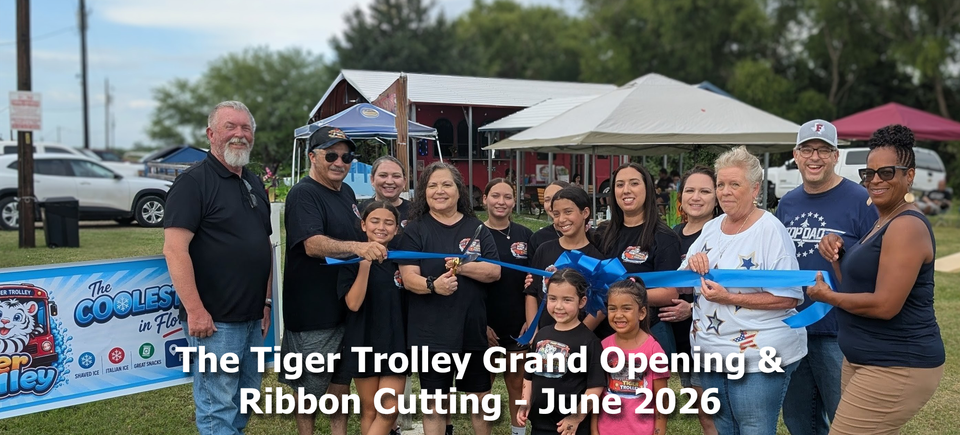 06 26   tiger trolly ribbon cutting
