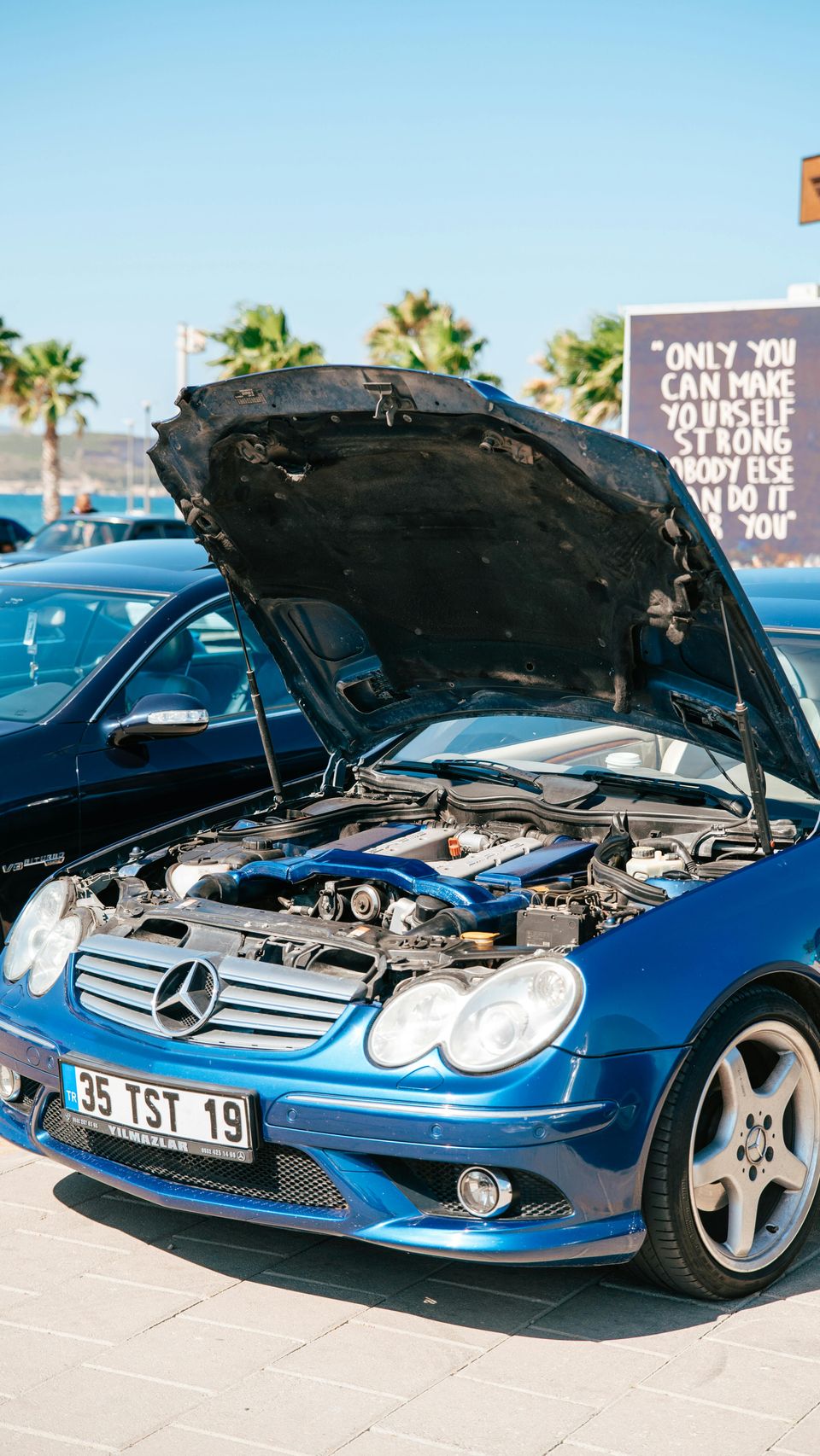Image of a blue Mercedes Benz getting scheduled service