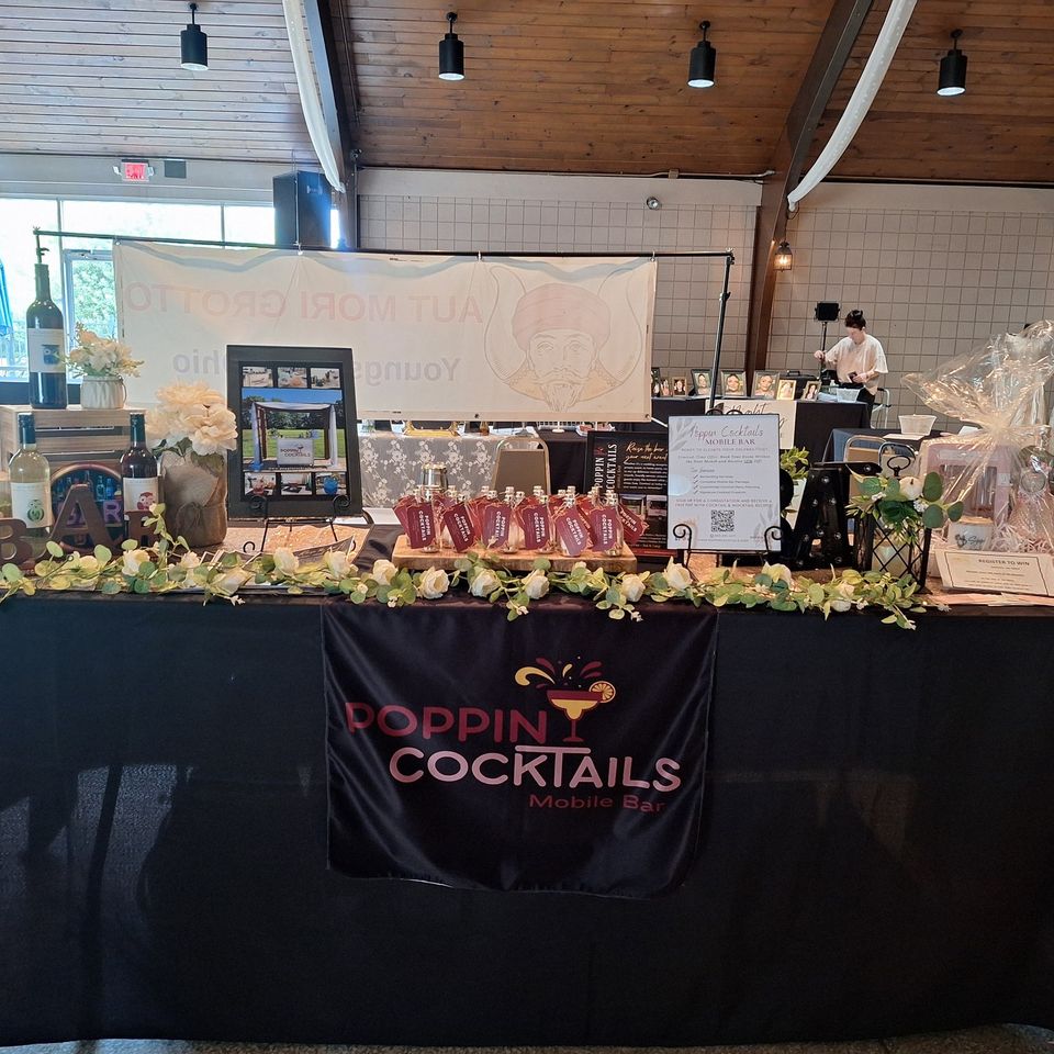 Poppin Cocktails display table at a bridal show 
