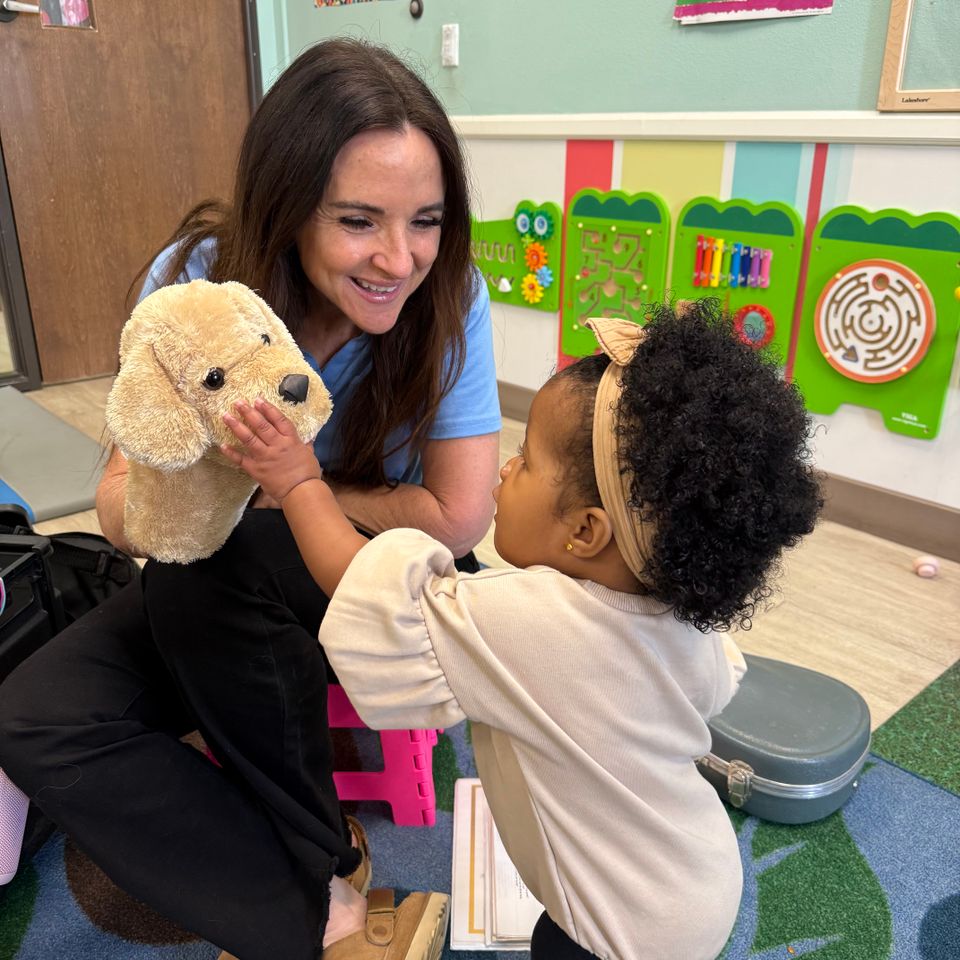 Claire with a puppet.