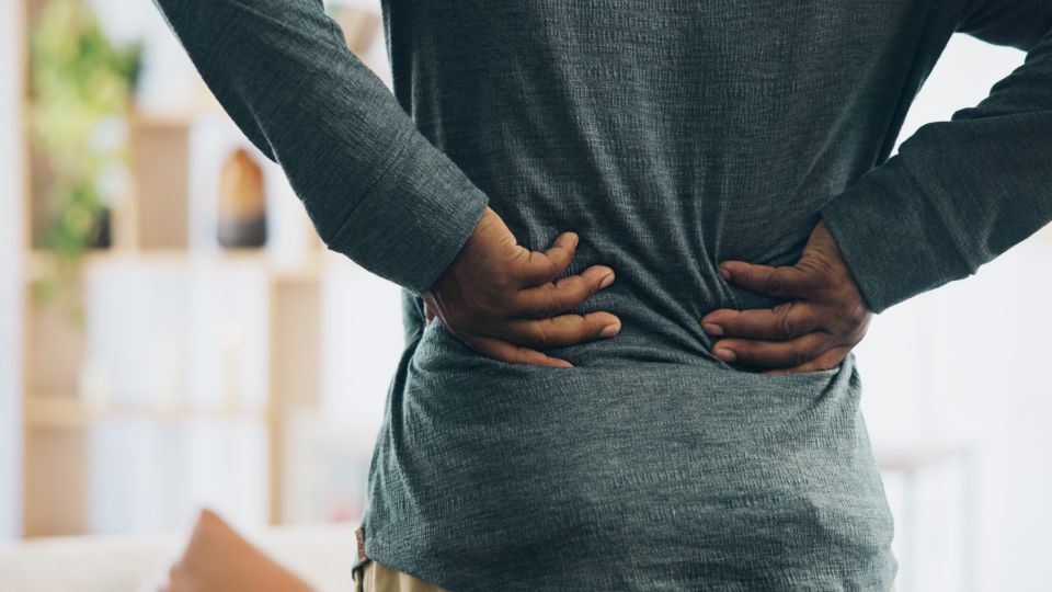 Person experiencing stiffness and mobility issues