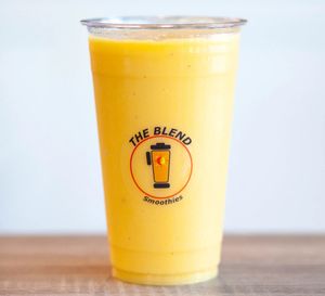 Orange Up smoothie made with fresh orange juice, peaches, banana, mango, orange sherbet, frozen yogurt, and added vitamins.