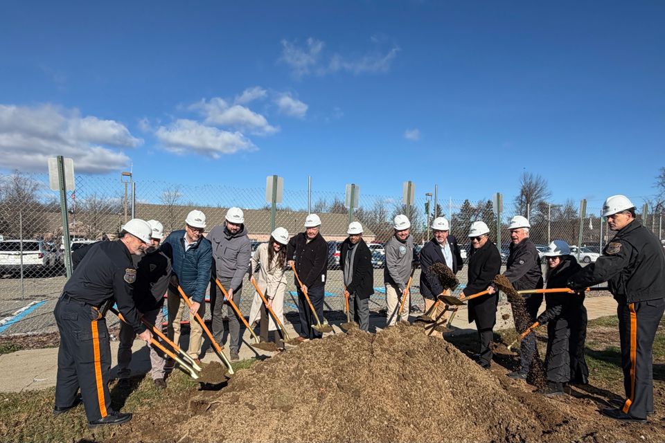Large group ground breaking health  center expansion 