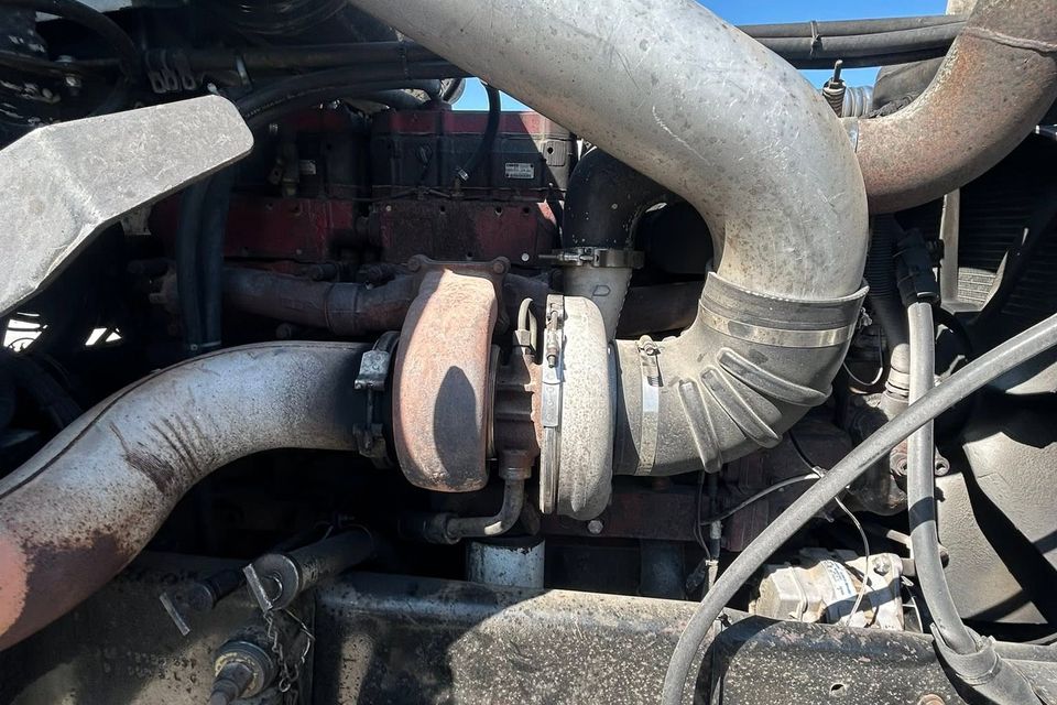 Cummins diesel engine turbocharger and intake piping during semi-truck repair in Arab Alabama