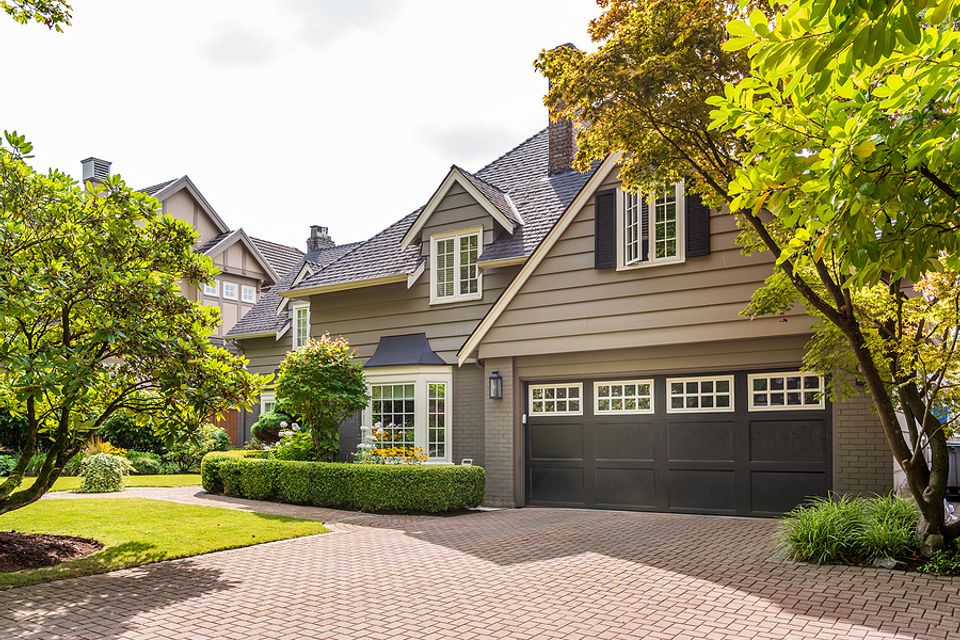 Bigstock houses in suburb at summer in  318771511 (1)