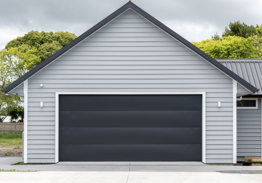 Gray vinyl siding attached garage