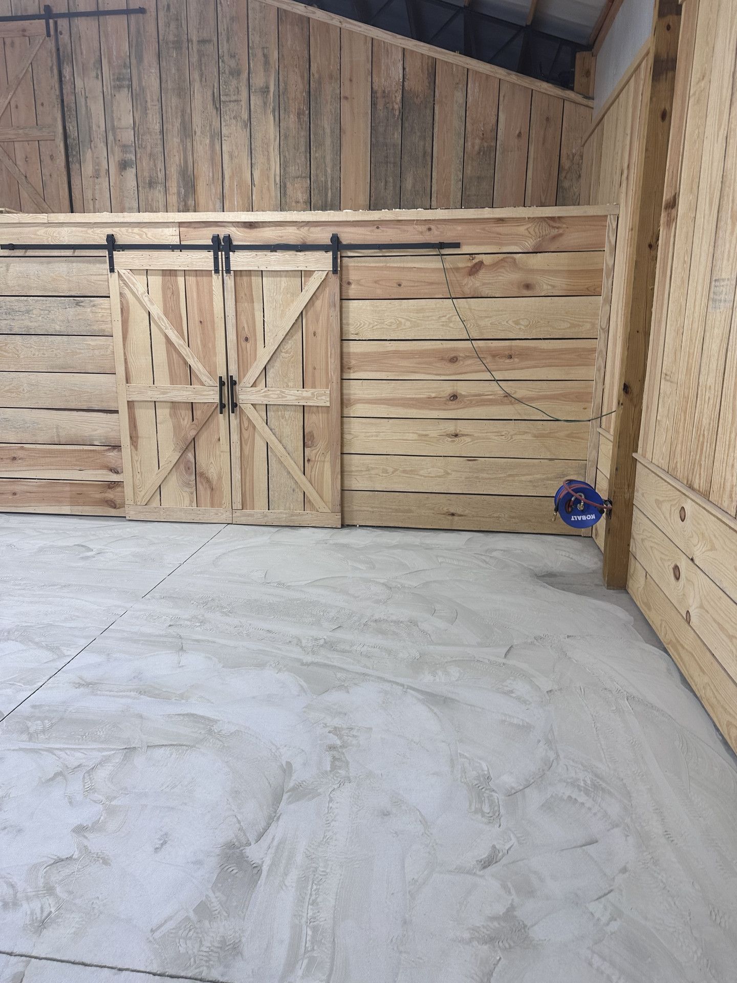 Before: additional view of concrete garage floor ahead of decorative finish