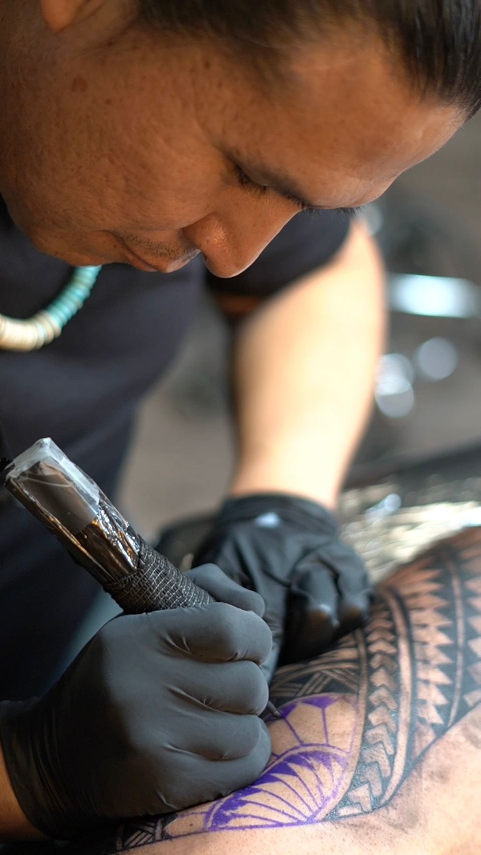 Image of Adrian Anderson - Crazy Eagle Tattoo Artist hard at work