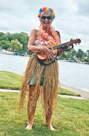 Pf sept helen flamm in luau spirit for wawa flotilla sub by jaymi shroder