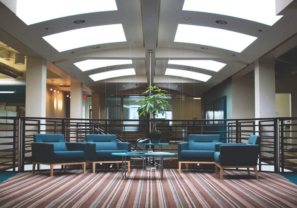 Carpet and blue chairs 