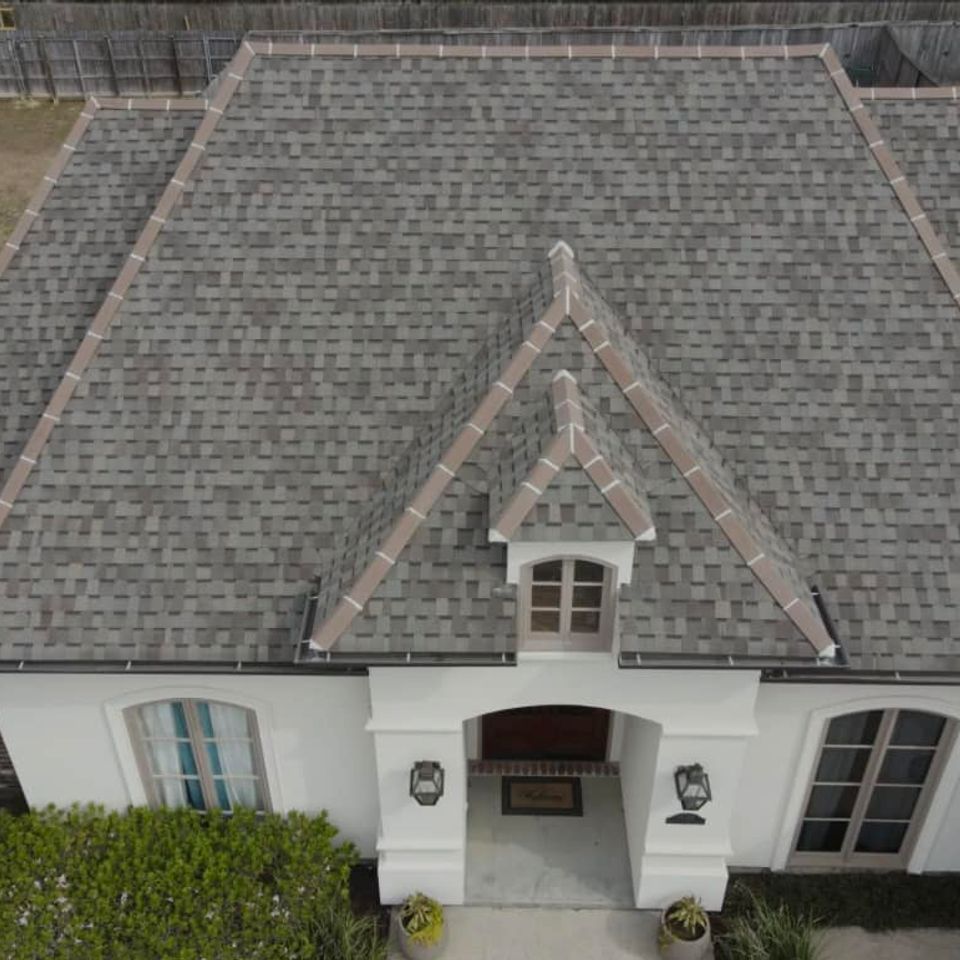 This homeowner chose Driftwood in our Owens Corning Duration brand with Ceramic capping!