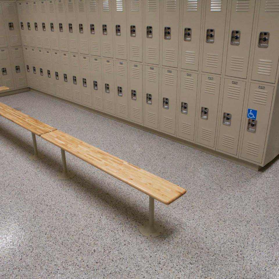 Locker room with EverStone Flakes flooring.