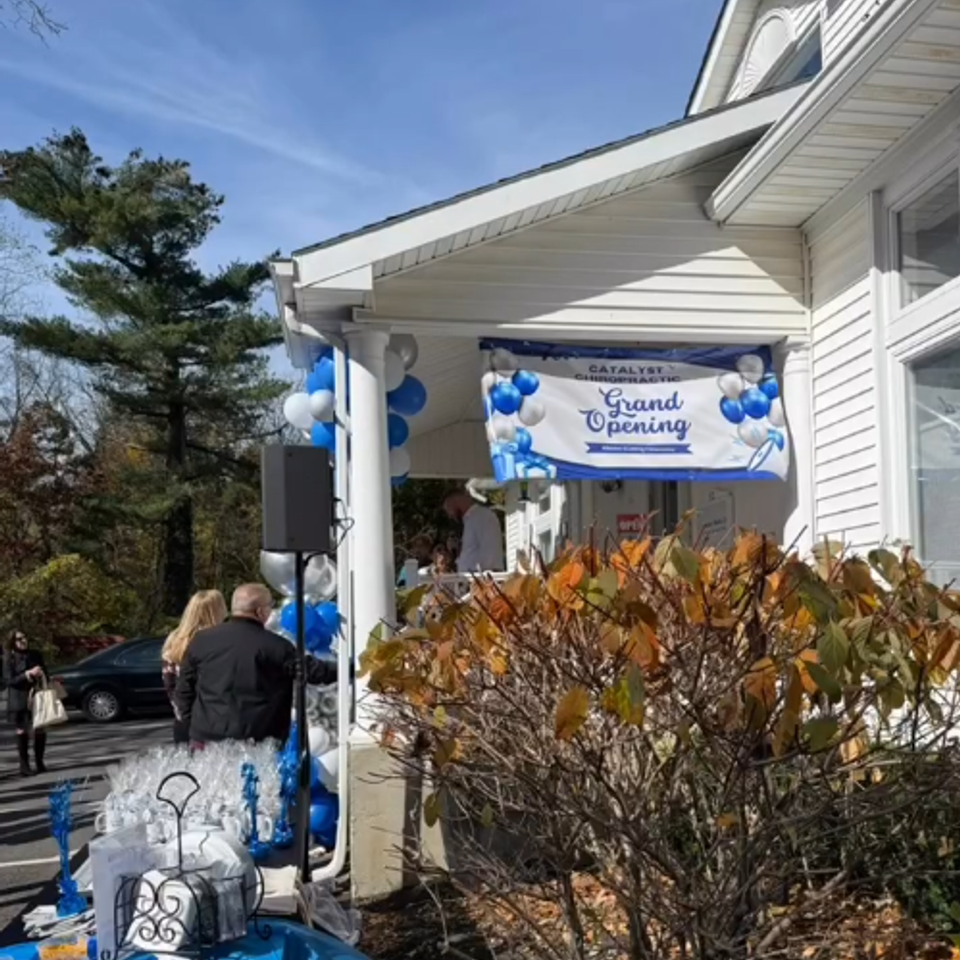 alt="The Party Savers staff bartending and waitressing at a Grand Opening event"