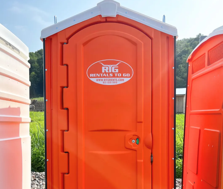 Construction porta potties positioned across work zones at a job site in Turkey, Texas
