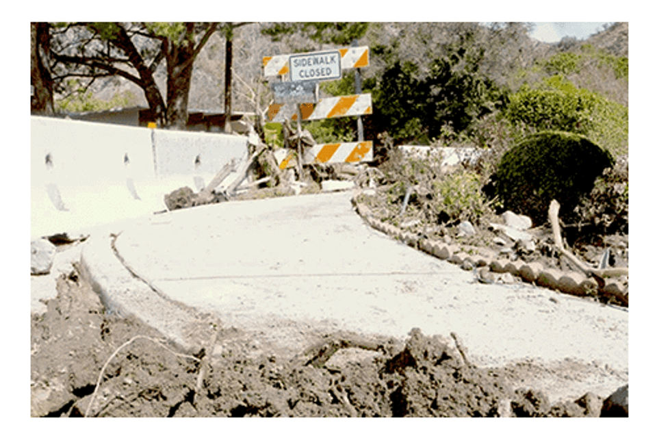 Damaged sidewalk closed
