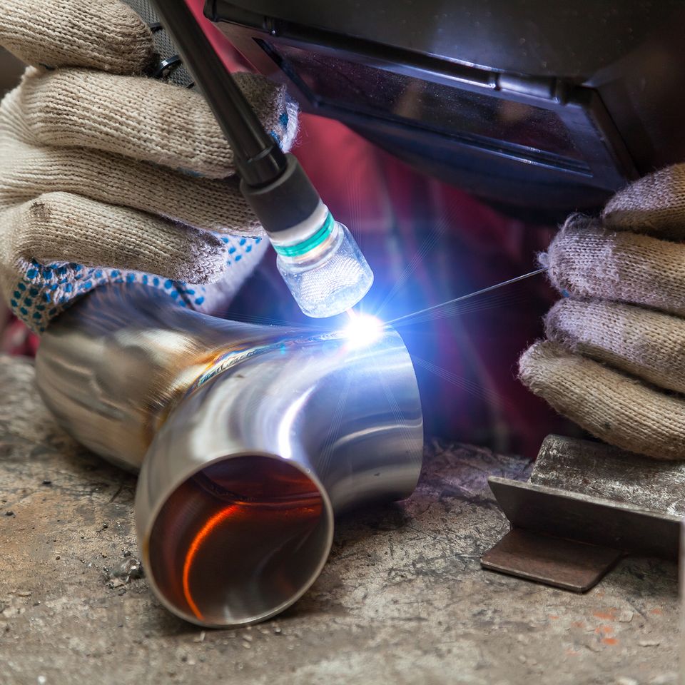 Bigstock young guy welder in a checkere 322344256