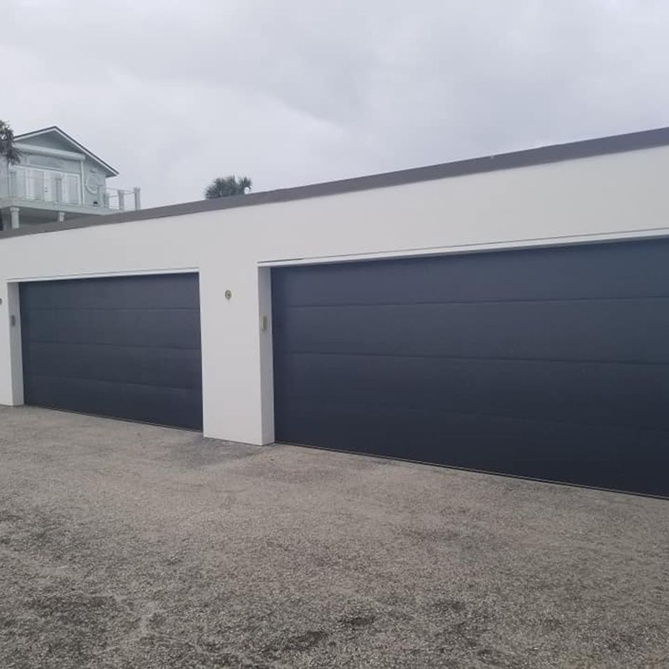 Tree of life2 retractable screen1garage doors