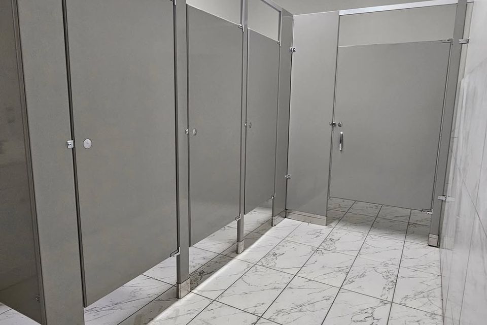 Gray bathroom partitions done by Pabst Leyton in Southern California