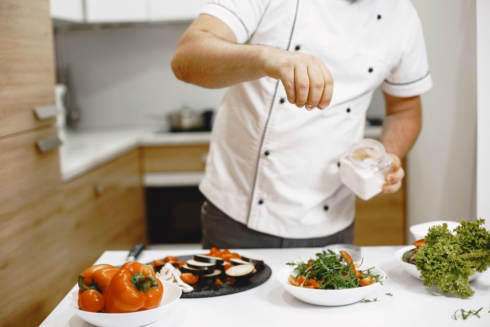 Chef standing kitchen home cooking