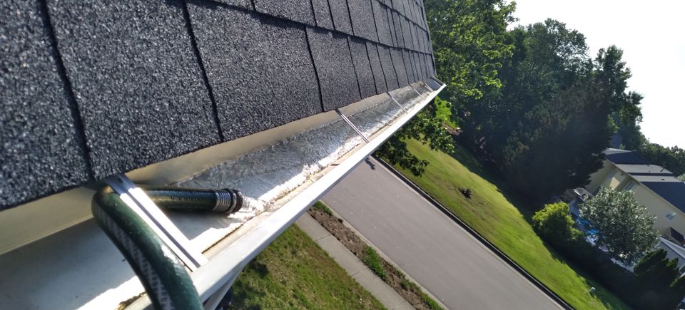 Residential and Commercial gutter cleaning services by Merida's Window and Gutter Cleaning of Raleigh, NC.