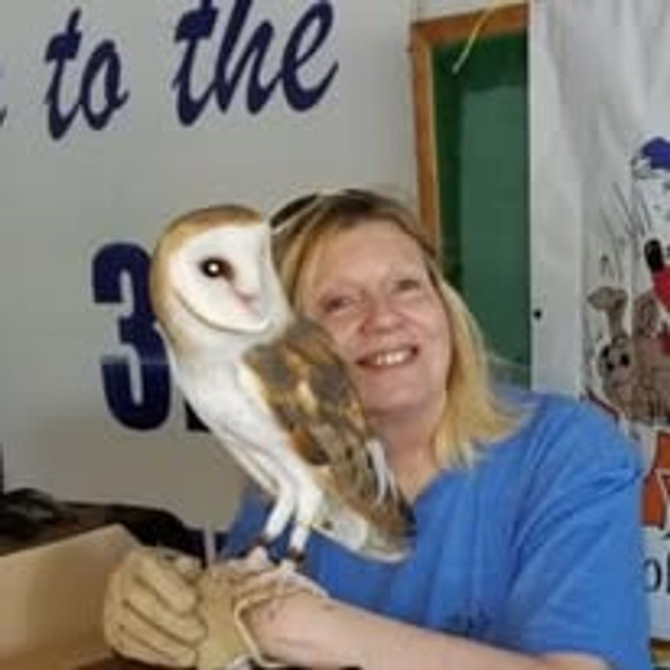 Suzi holding a barn owl