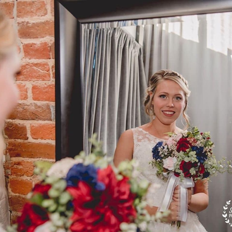 bride with bouquet at the coleman vault