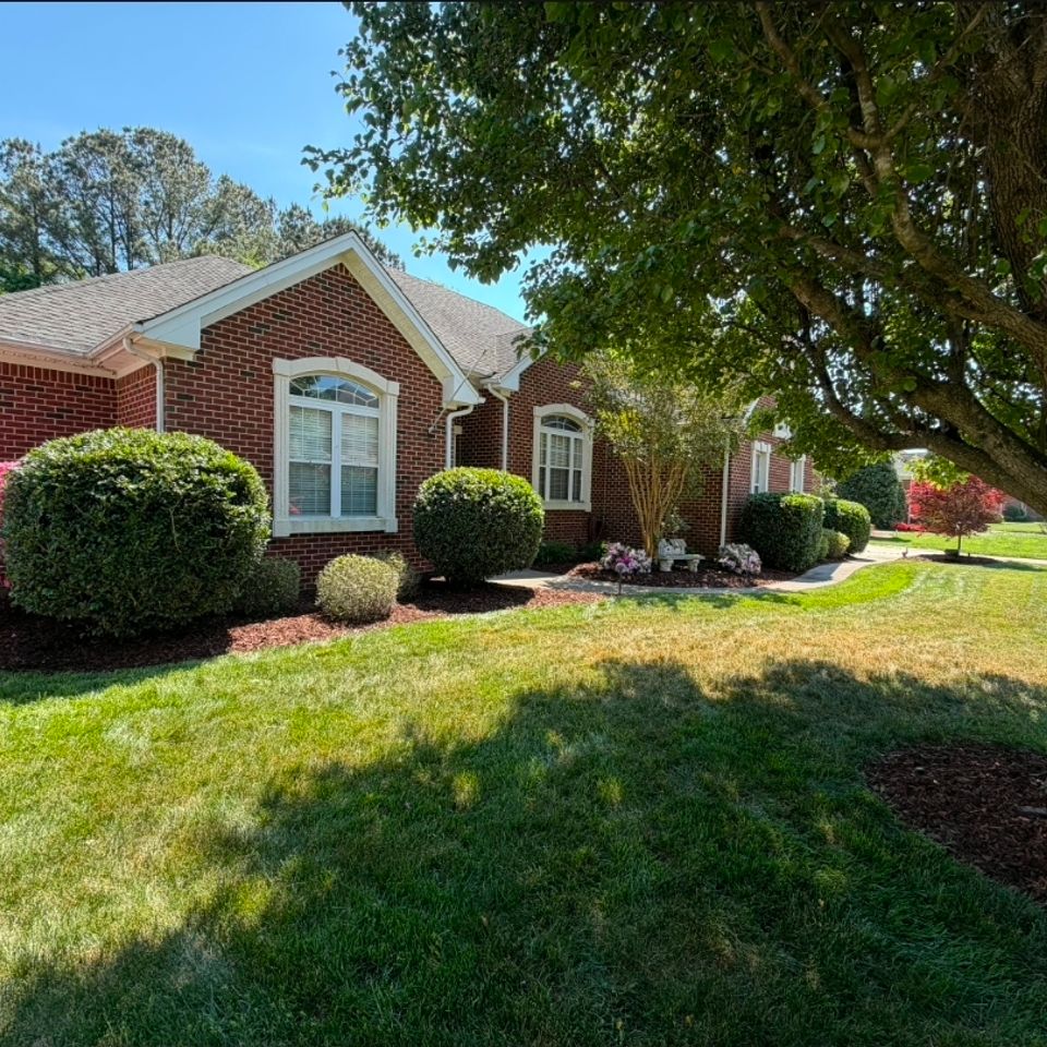Hedge trimming work, done by Get A Mow On of Chesapeake VA