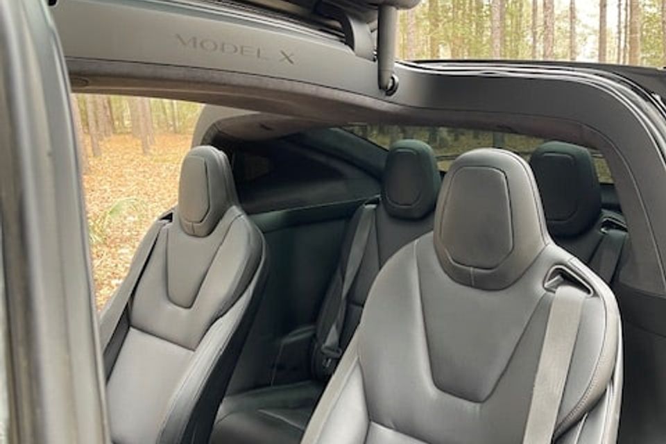 Abner shotwell tesla model x   back wing doors open closeup min