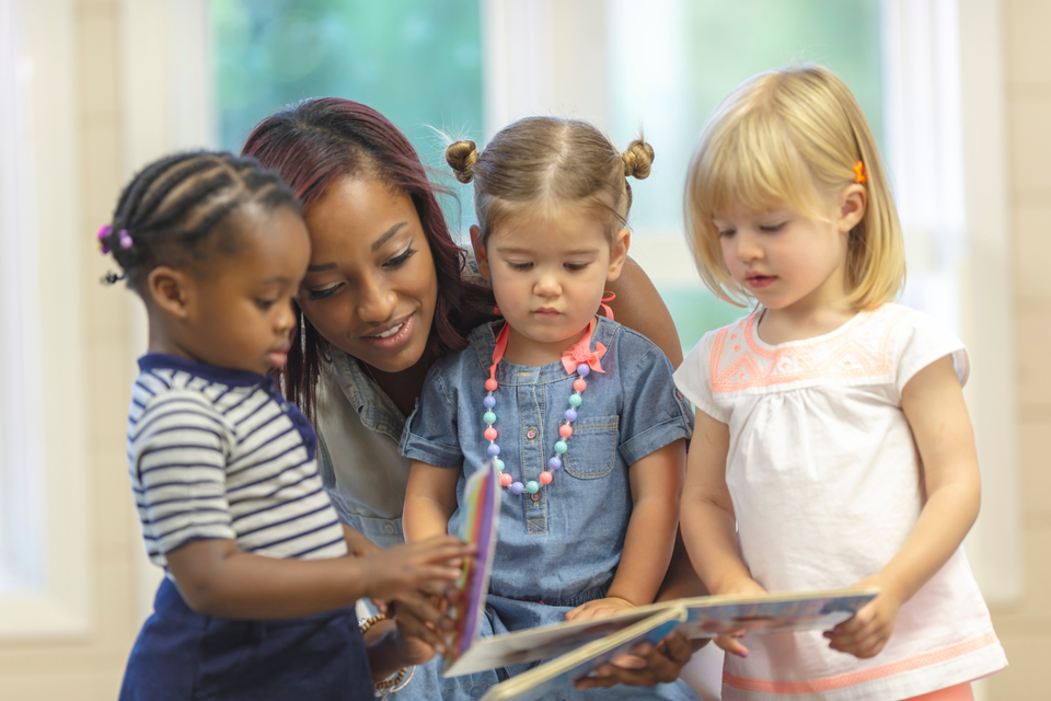 Athletic Brains Daycare Teacher with tree toddlers