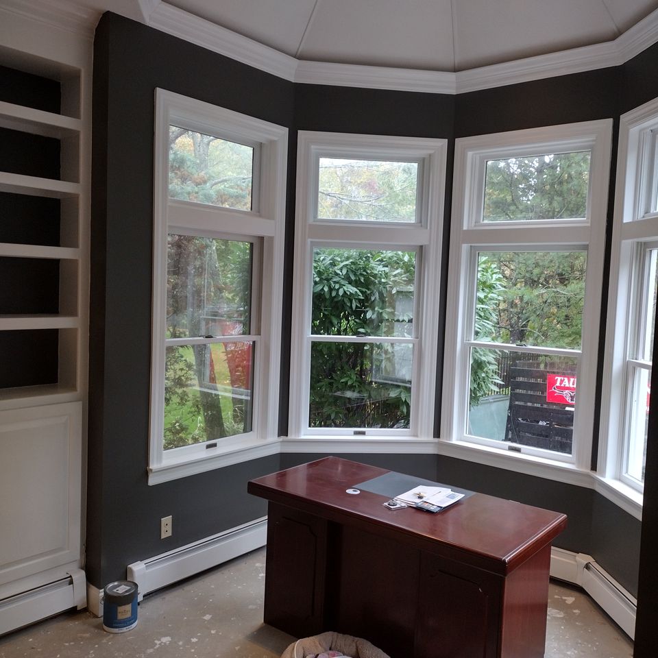 A new coat of paint applied around windows, done by Taurus Contracting Inc. of Suffolk County , NY