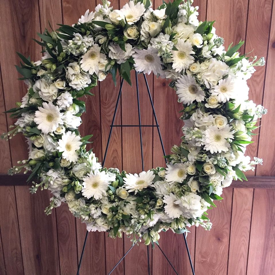 Hcf wreath white wood background