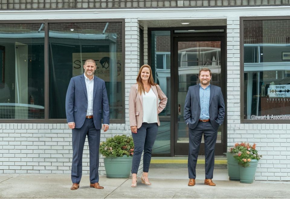 Steven Stewart, Andrew Meadlock, and Jamie Stewart of Stewart & Associates Insurance in Lenoir, NC