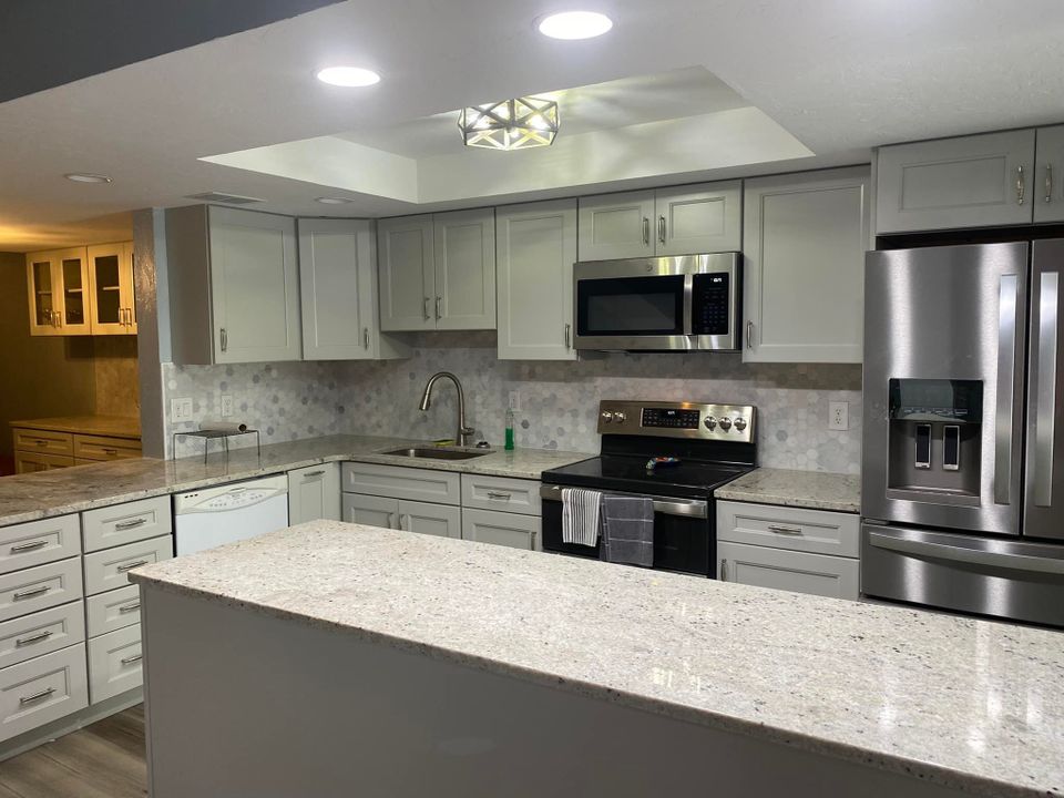 Smart Flooring Solutions Flooring and Cabinet Installations