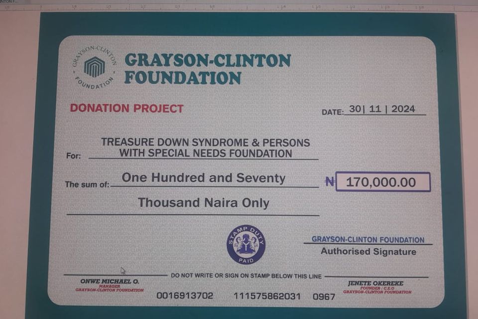 Donation cheque   treasure down syndrome