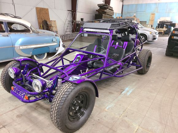 Close-up of a custom off-road vehicle featuring a professionally fitted custom windshield and glass installation.
